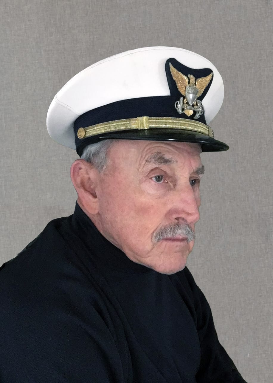 Andrew J. Key Jr. — reflective side portrait in officer's cap